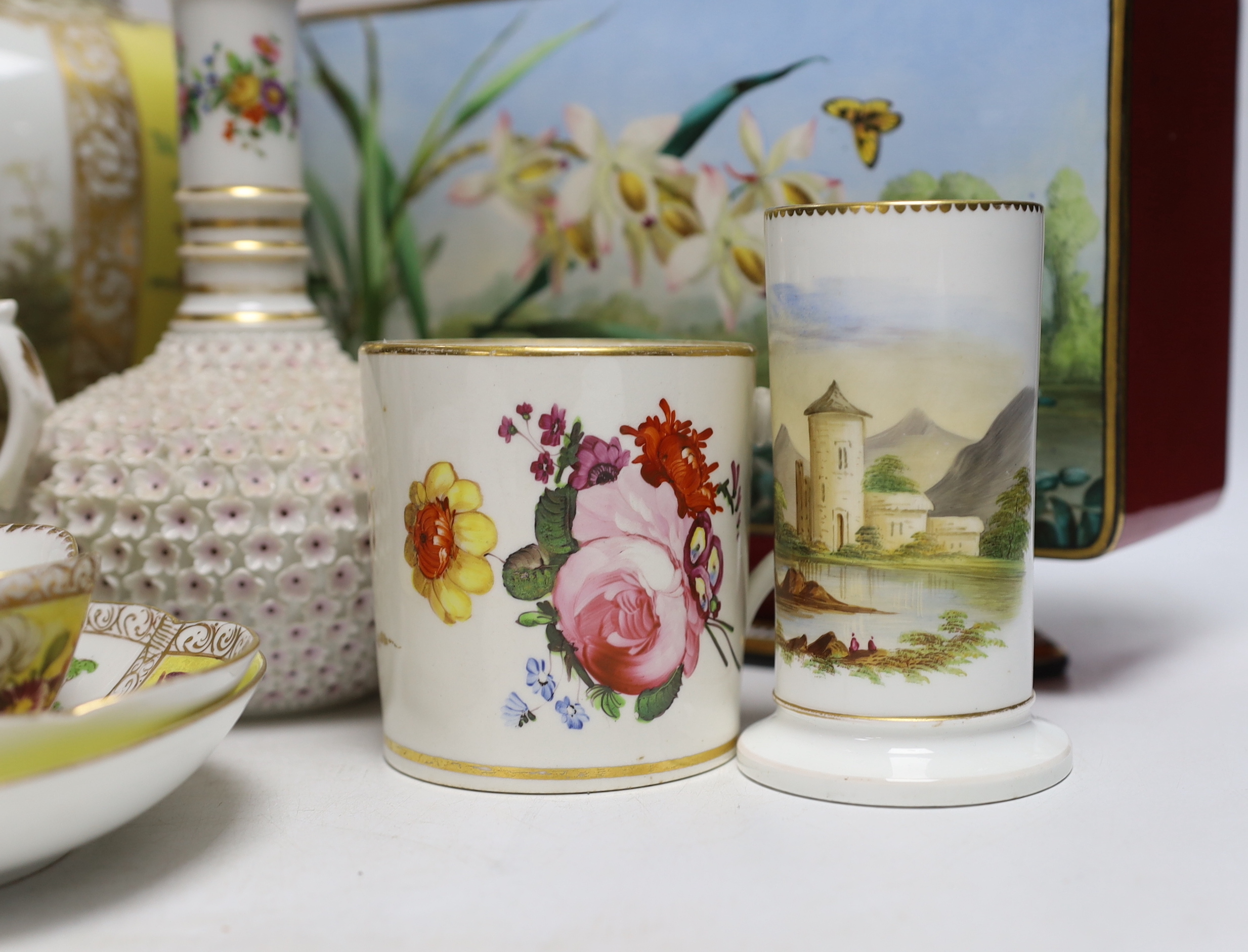 A Dresden jar and cover and similar cup and saucer, a large floral vase, two floral mugs, a floral encrusted bottle and stopper and two other items, largest 28cm high (8)